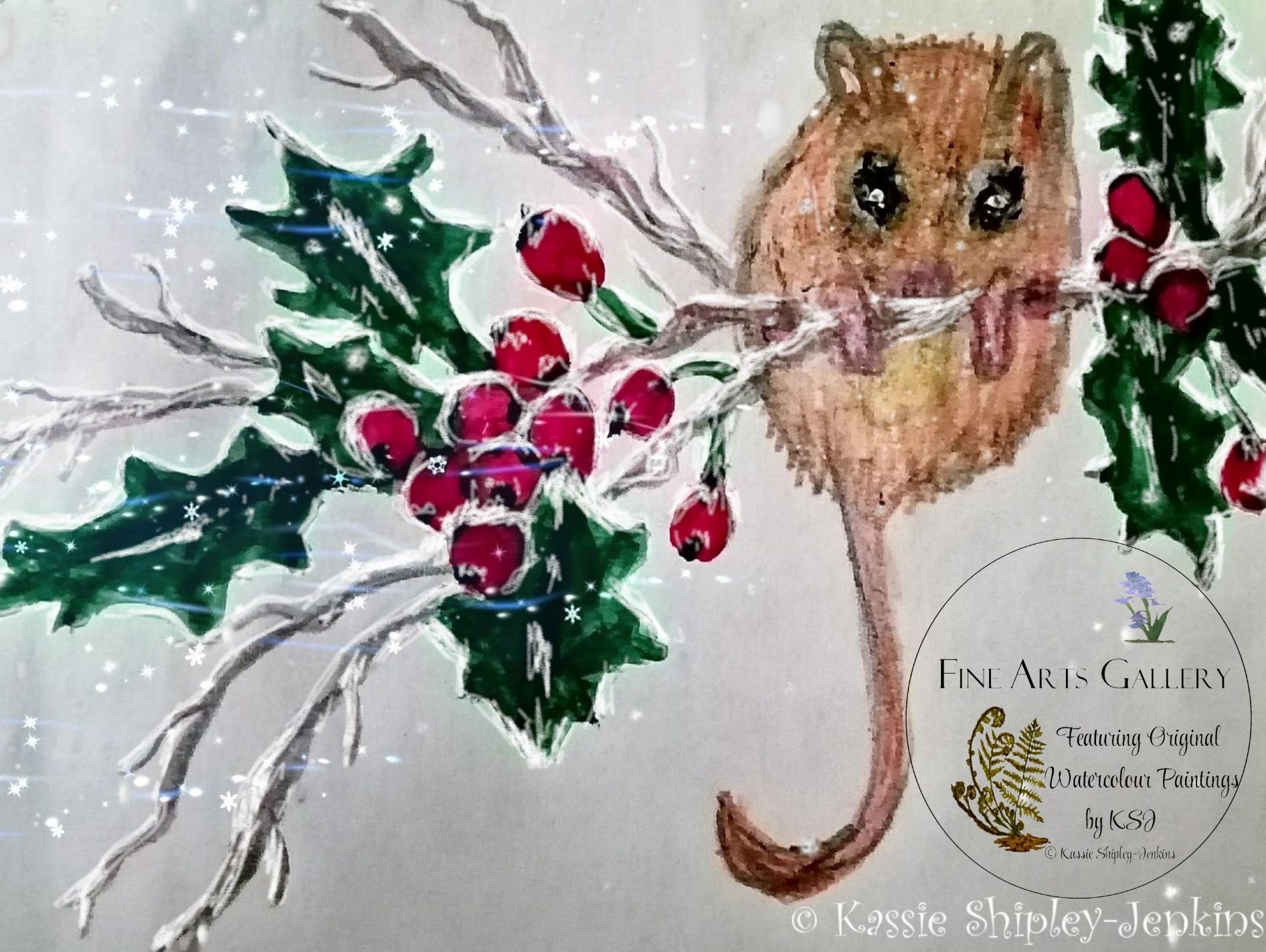 A mouse in the holly thats covered in snow